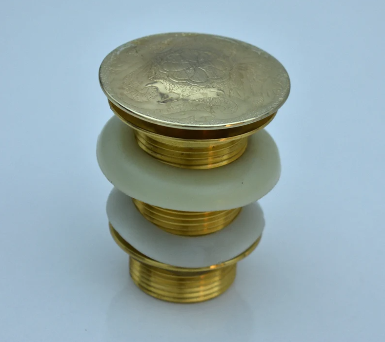 Engraved unlacquered brass sink drain, solid brass drain, pop-up drain